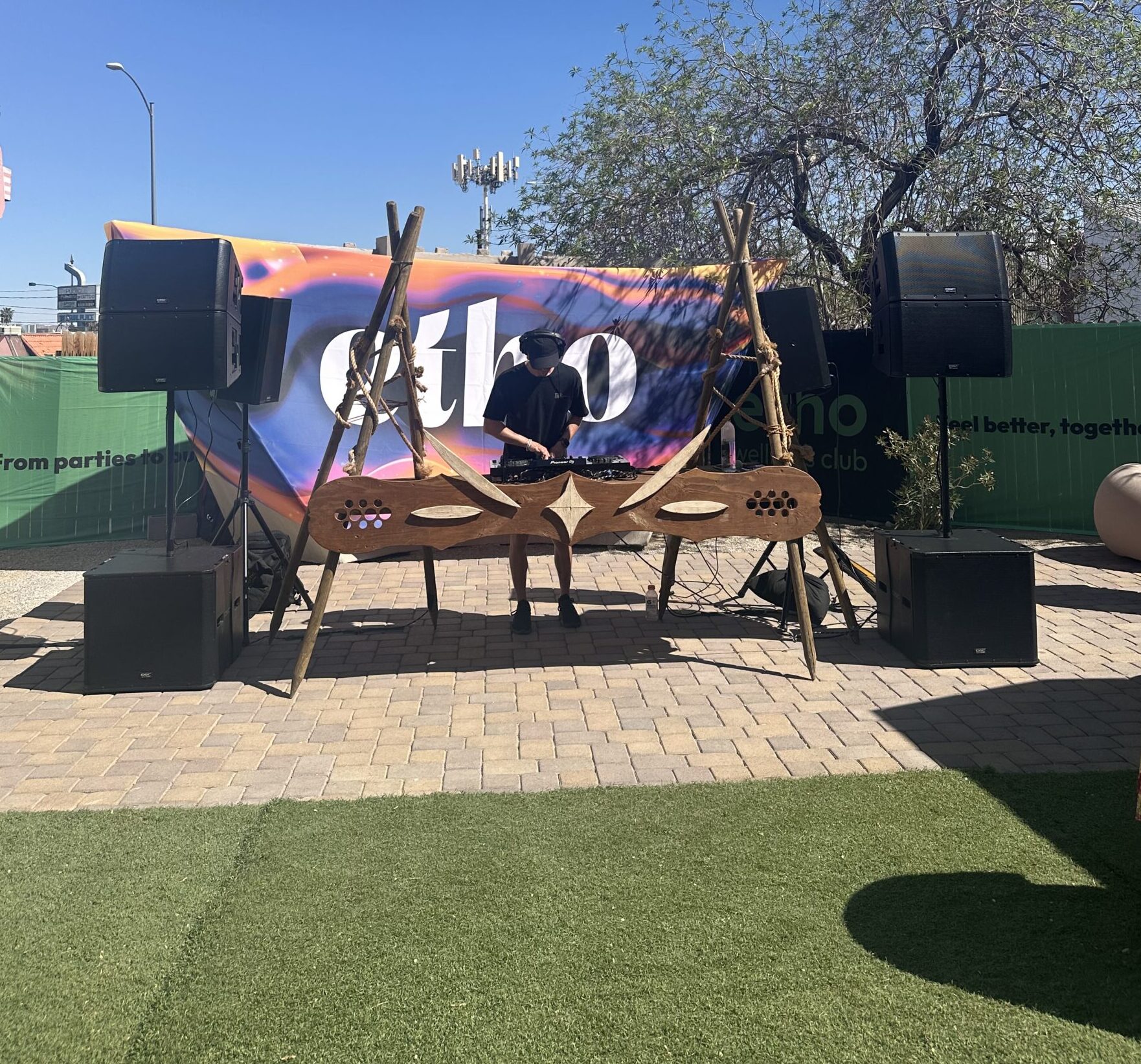 DJ booth set up at open-air outdoor venue
