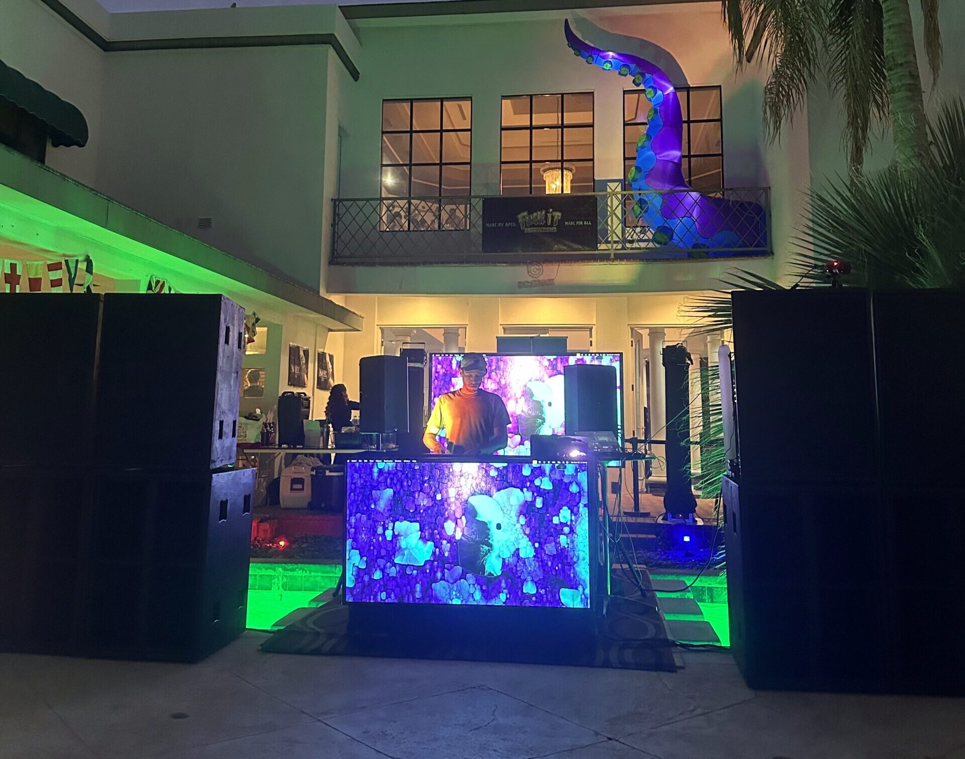 arge DJ sound system with speakers and subwoofers for outdoor event
