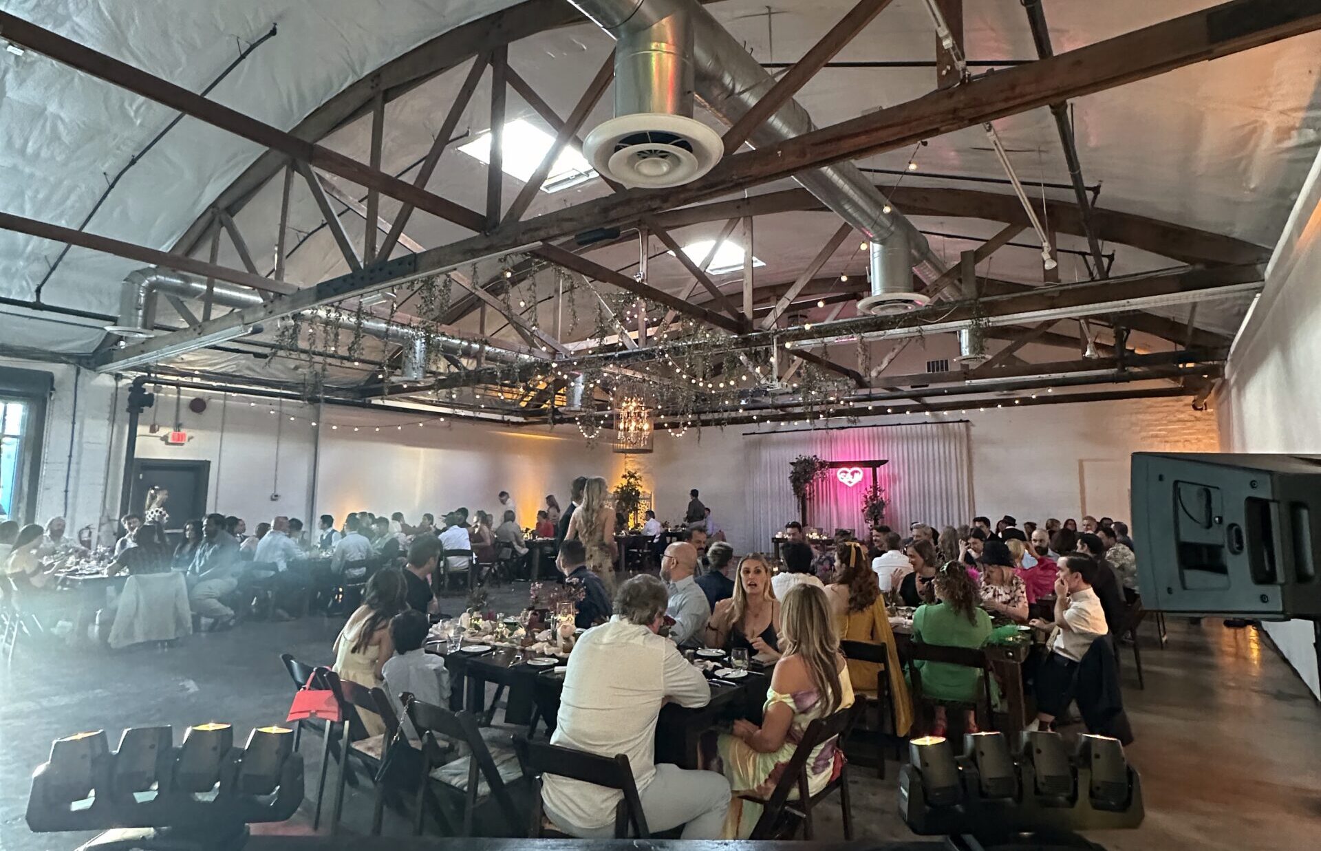 People enjoying dinner at indoor Las Vegas wedding venue