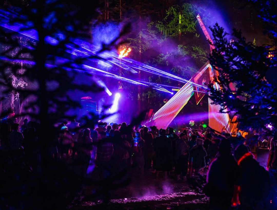 stage and laser set up by Dusk Till Dawn at an outdoor festival
