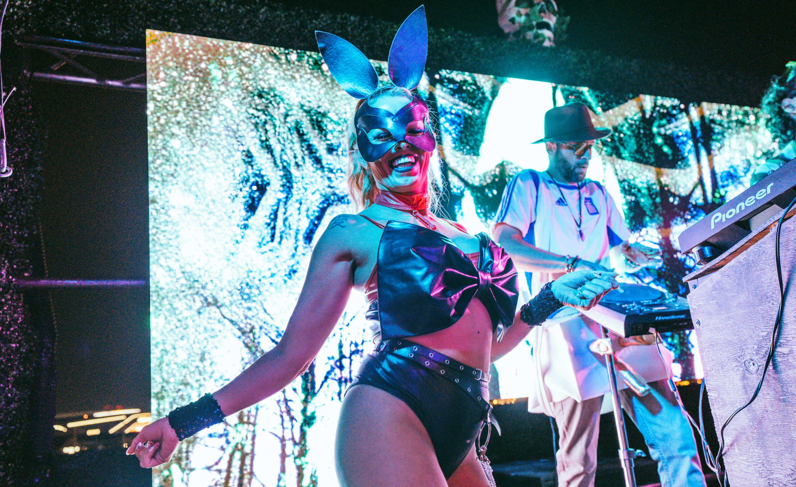 Gogo dancer dresses in leather bunny outfit
